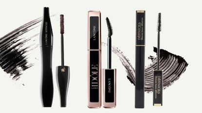 A collage of the best Lanc&ocirc;me mascaras including the Lanc&ocirc;me Hypn&ocirc;se, Lash Id&ocirc;le and Definicils mascaras, featured on a off-white background with mascara makeup streaks.