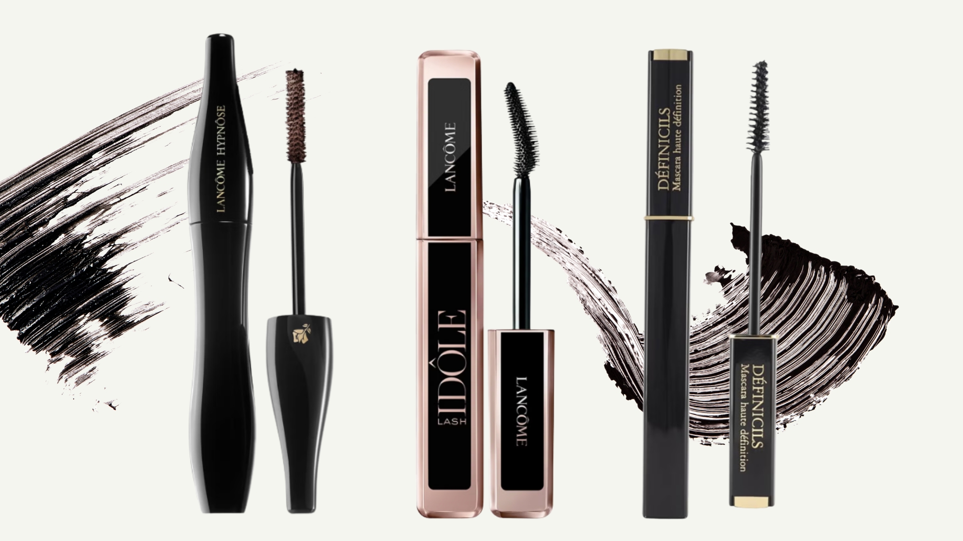 A collage of the best Lancôme mascaras including the Lancôme Hypnôse, Lash Idôle and Definicils mascaras, featured on a off-white background with mascara makeup streaks.