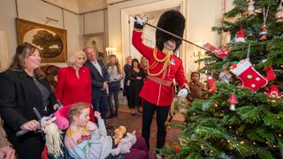 Queen Camilla invites children supported by Helen & Douglas House and Roald Dahl's Marvellous Children's Charity to decorate the Christmas tree at Clarence House