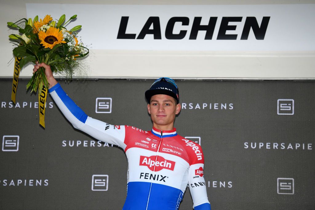 LACHEN SWITZERLAND JUNE 07 Mathieu Van Der Poel of Netherlands and Team AlpecinFenix stage winner celebrates at podium during the 84th Tour de Suisse 2021 Stage 2 a 178km stage from Neuhausen am Rheinfall to Lachen Rain UCIworldtour tds tourdesuisse on June 07 2021 in Lachen Switzerland Photo by Tim de WaeleGetty Images