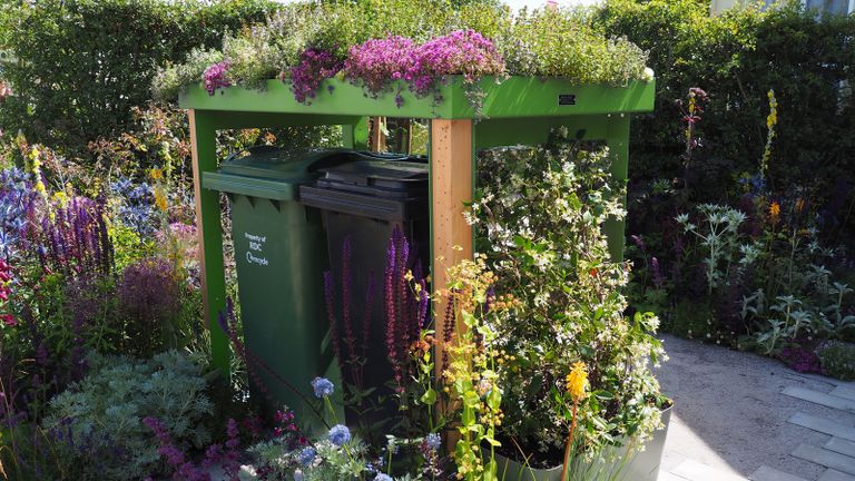bespoke wheelie bin storage ideas with a green roof in a small front garden