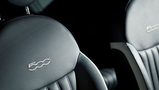 Close up view of black leather car seats