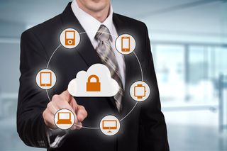Man pointing to hybrid cloud with padlock inside