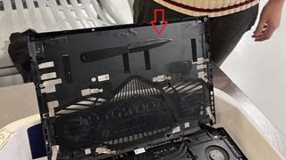 Knife hidden in a laptop chassis.