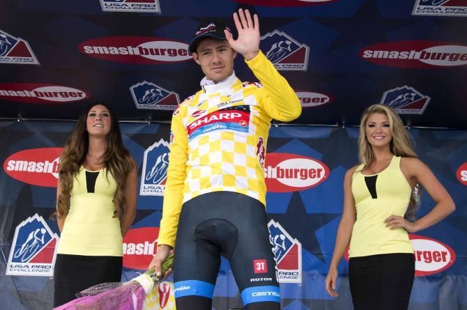 Alex Howes (Garmin-Sharp) gives a wave from the podium