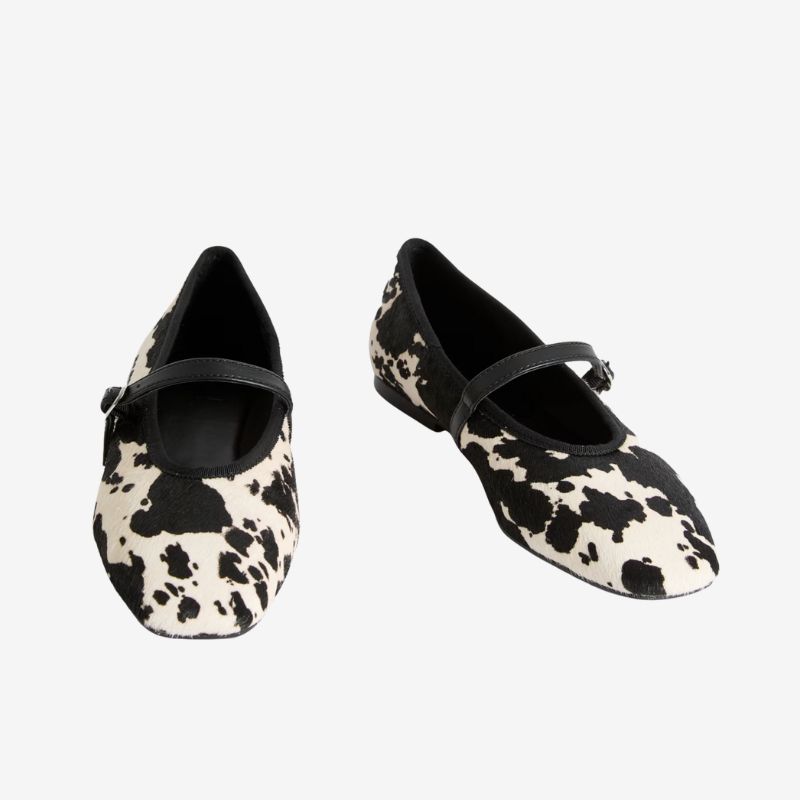 Image of cow print ballet flats
