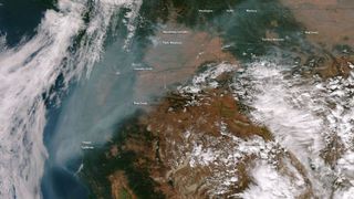 The Suomi NPP satellite snapped this photo of haze from wildfires throughout the northwest United States hanging over the West Coast on Sept. 24, 2012.