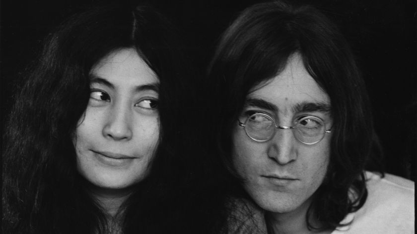 John Lennon and Yoko Ono look at each other in 1968.