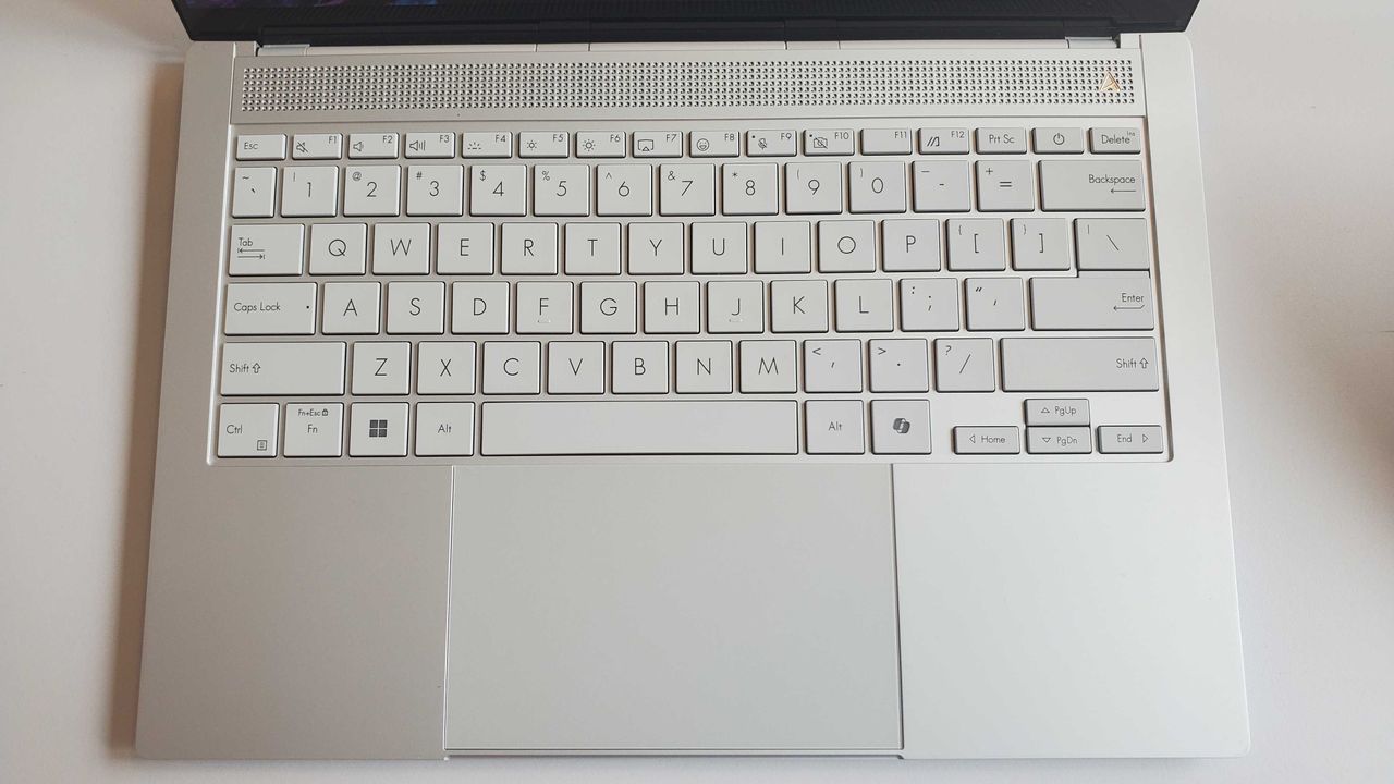 light silver laptop on table