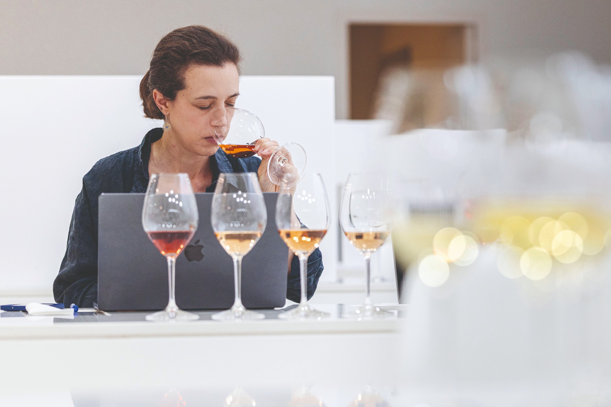 Woman tasting wine