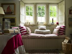 Drawing-room-sofa-in-15th-century-mill-cottage-throw-cushions