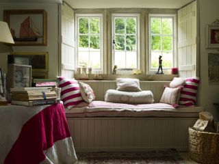 Drawing-room-sofa-in-15th-century-mill-cottage-throw-cushions