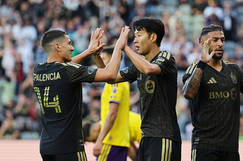 LOS ANGELES, CALIFORNIA - APRIL 04: Sergi Palencia #14 and Son Heung-Min #7 of Los Angeles FC celebrate the first goal of the team scored by an owngoal from David Brekalo #4 of Orlando City (not in frame) during the MLS match between Los Angeles Football Club and Orlando City SC at BMO Stadium on April 04, 2026 in Los Angeles, California. (Photo by Kevork Djansezian/MLS via Getty Images)