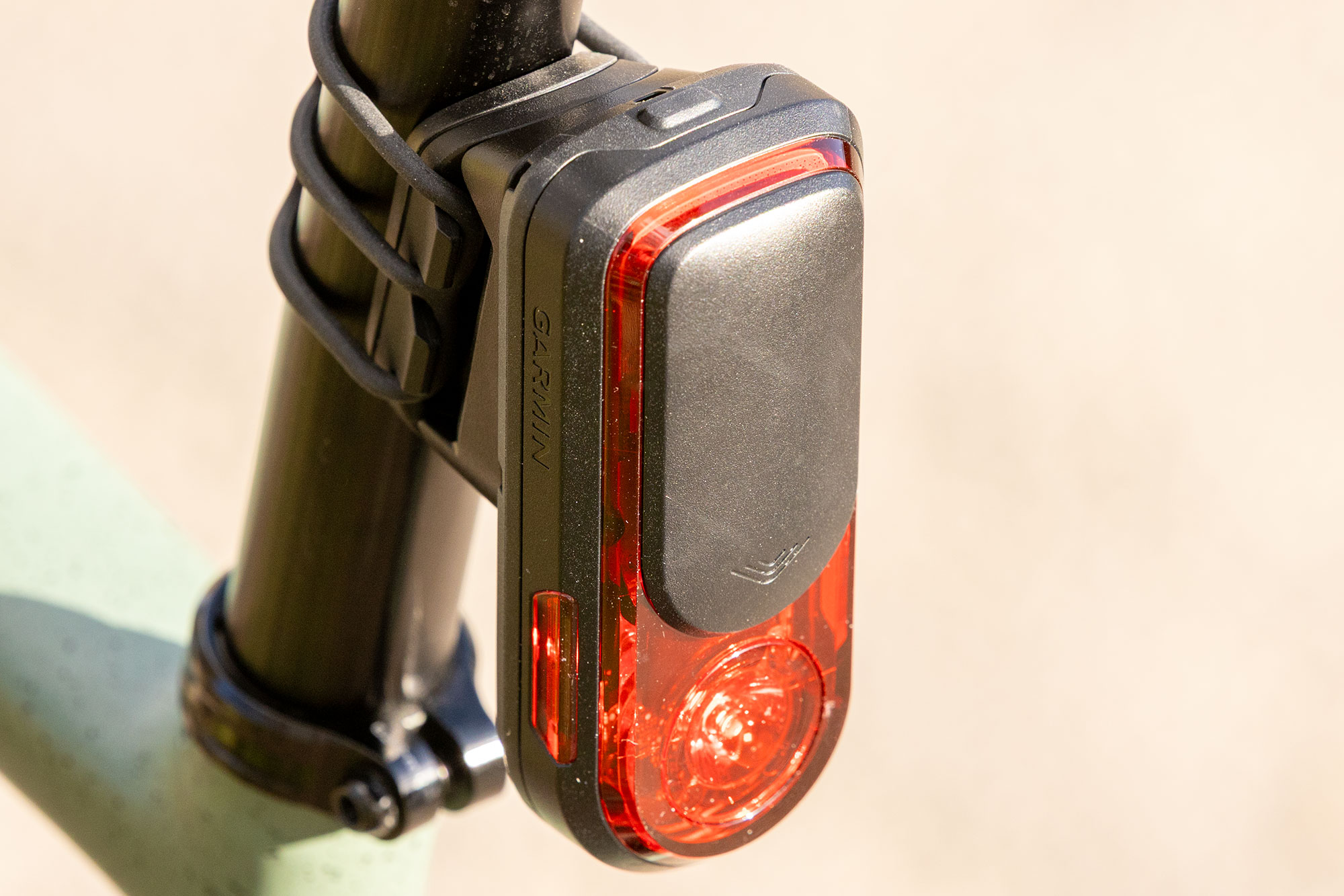 Garmin Varia RearVue 820 pictured on seatpost, viewed three quarters on from rear
