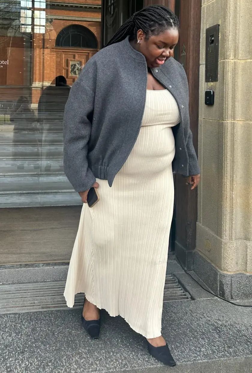 @abimarvel wears a wool bomber jacket