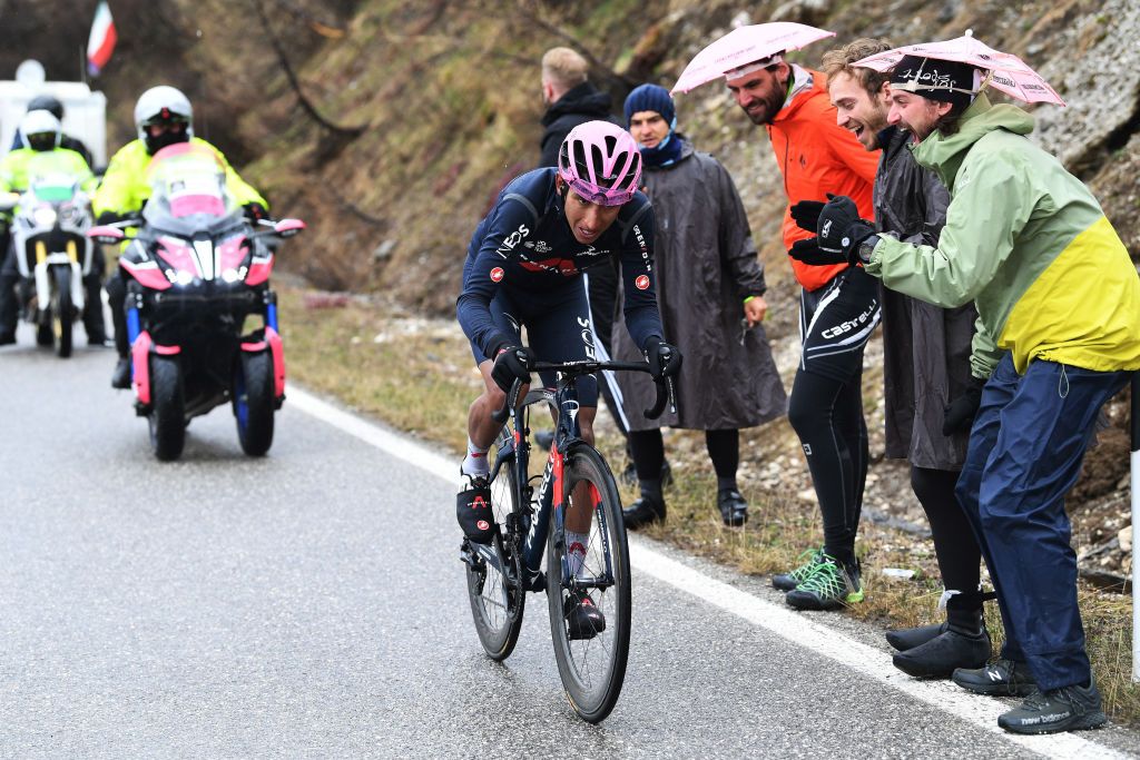 CORTINA DAMPEZZO ITALY MAY 24 Egan Arley Bernal Gomez of Colombia and Team INEOS Grenadiers Pink Leader Jersey in breakaway during the 104th Giro dItalia 2021 Stage 16 a 153km stage shortened due to bad weather conditions from Sacile to Cortina dAmpezzo 1210m Public Fans girodiitalia Giro on May 24 2021 in Cortina dAmpezzo Italy Photo by Tim de WaeleGetty Images
