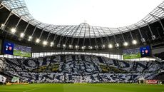 View of the South Stand at Tottenham Hotspur Stadium, with fans holding up a TIFO which reads "North LDN Since 1187".