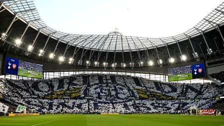 View of the South Stand at Tottenham Hotspur Stadium, with fans holding up a TIFO which reads "North LDN Since 1187".