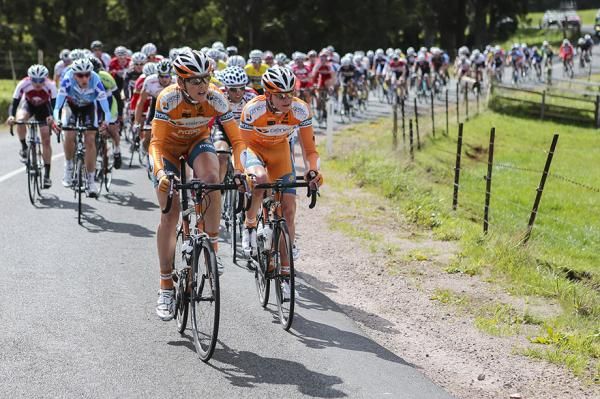 Genesys Wealth Advisers Professional Cycling Team riders at the front