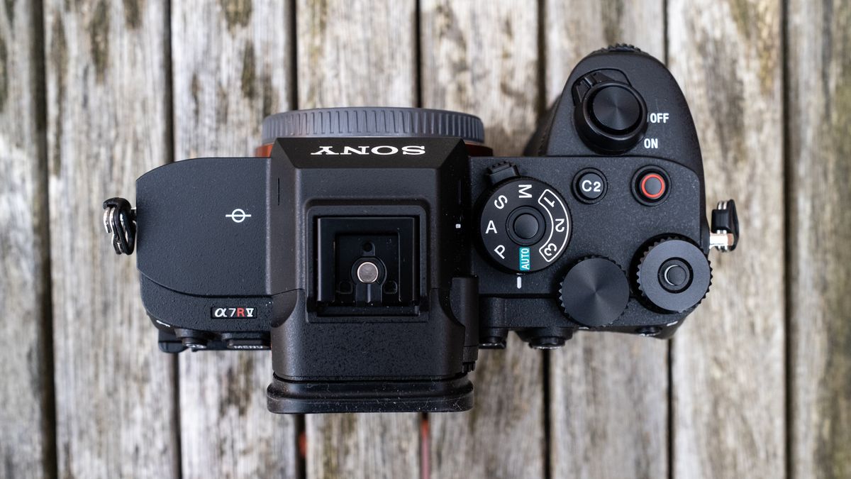 The Sony A7R V on a table view of the top and without a lens