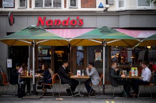 picture of a Nandos restaurant - the government will offer 50 off in Eat Out to Help Out scheme