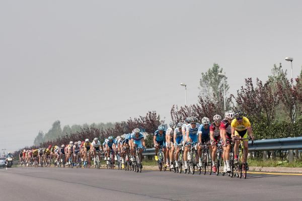 The yellow jersey leads the peloton during the stage.