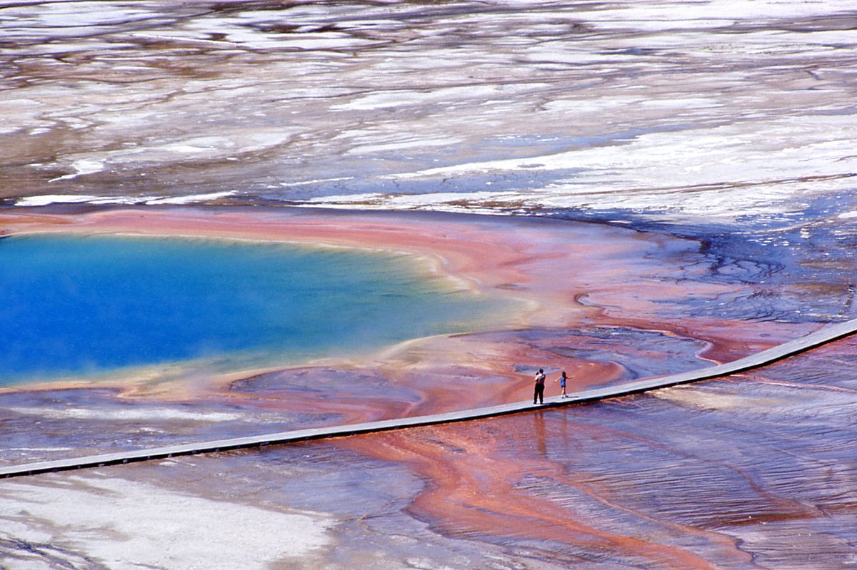 Yellowstone visitors view Grand Prismatic from a nearby boardwalk