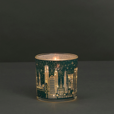 Green M&S Light up candle depicting the New York Skyline