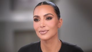 A close-up of Kim Kardashian's face is shown in The Kardashians Season 5 episode "Get It Together."