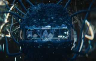 A little alien being inside a microscopic biological spaceship