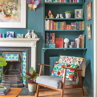 blue living room with alcove shelves