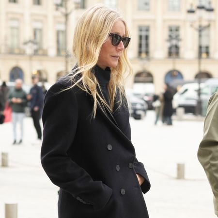 Gwyneth Paltrow wears a black peacoat during Paris Fashion Week in September 2024