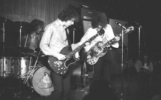 (from left) Jack Bruce, Ginger Baker, and Eric Clapton perform at the Cafe Au Go Go in New York City in October 1967