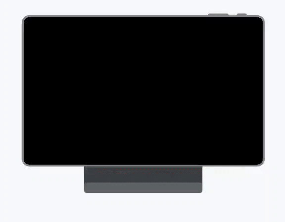 Animation of a tablet docking with the Google Assistant logo