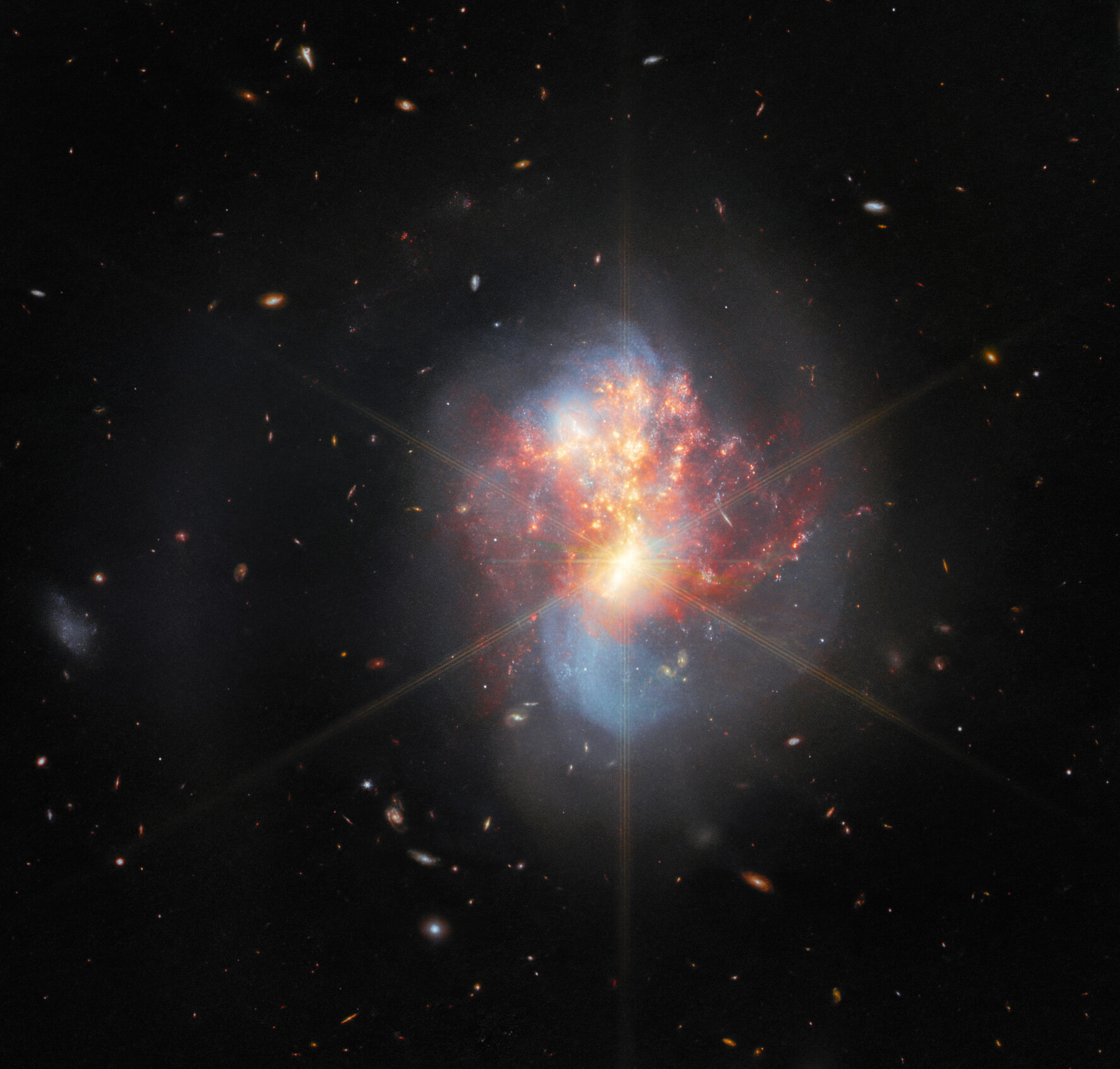 Merging galaxies with a black hole center
