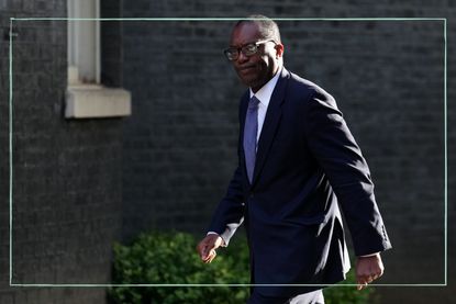 Chancellor Kwasi Kwarteng walking down the street