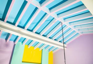 Colourful ceiling inside the studio of Adam Nathaniel Furman