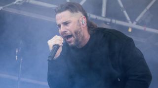 M. Shadows of Avenged Sevenfold singing onstage in 2025