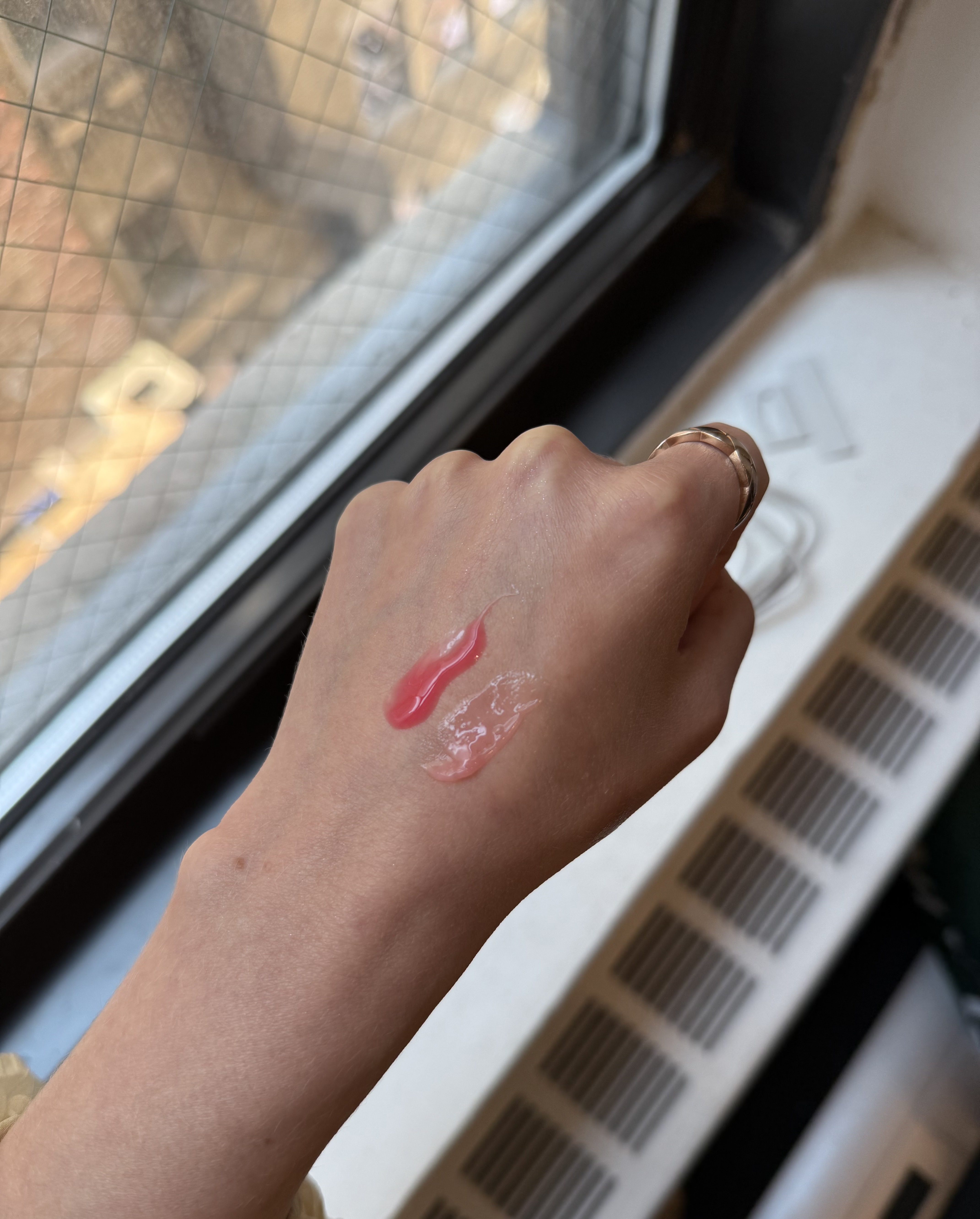 Jamie Schneider testing Summer Fridays Lip Butter Balms.