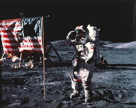 Apollo 17 commander Gene Cernan salutes the deployed United States flag on the lunar surface in December 1972.