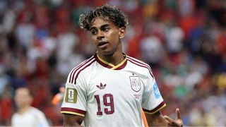 Lamine Yamal, wearing white, of Spain looks to his right during his side's World Cup 2026 campaign.