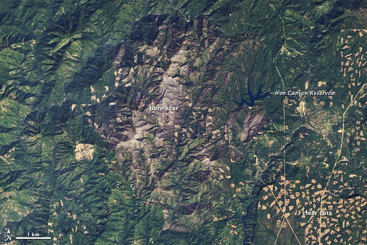 A NASA satellite took this natural color image of the scar left by the Bagley fire near Big Bend, Calif., on Sept. 11. Burned areas appear as bare brown spots of exposed earth. 