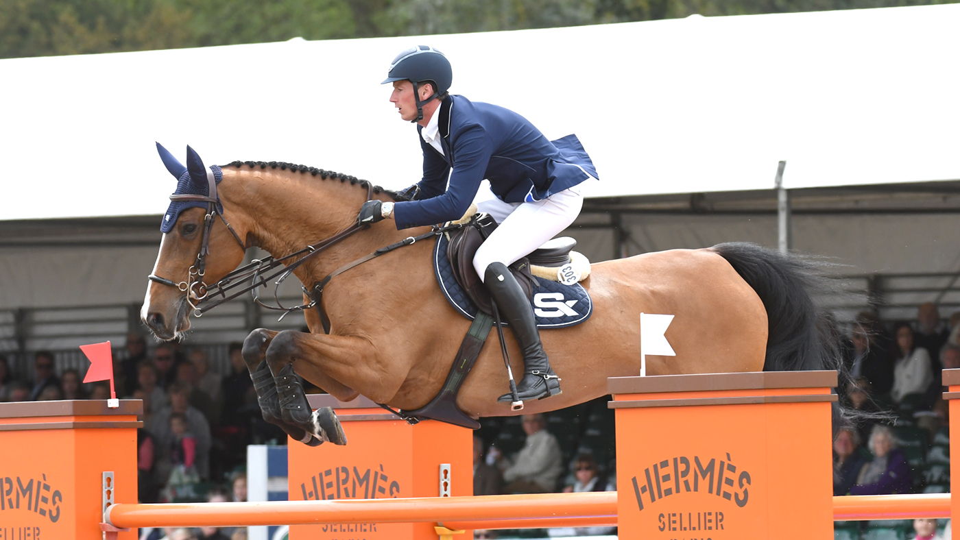 Daniel Deusser riding EQUITA VAN T ZORGVLIET winner of the Bahrain Pearl Stake during the Royal Windsor Horse Show private grounds of Windsor Castle, in Windsor in the county of Berkshire, UK