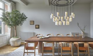 modern farmhouse dining room with chandelier light