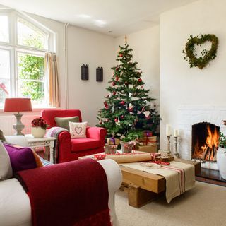 white living room with sofa and fire place