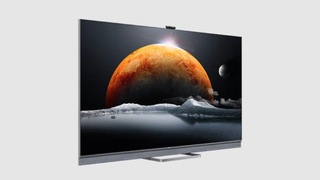 TCL C825 displaying a planet and moon style landscape