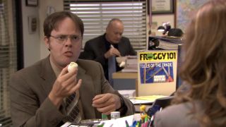 Dwight holding a hardboiled egg in The Office