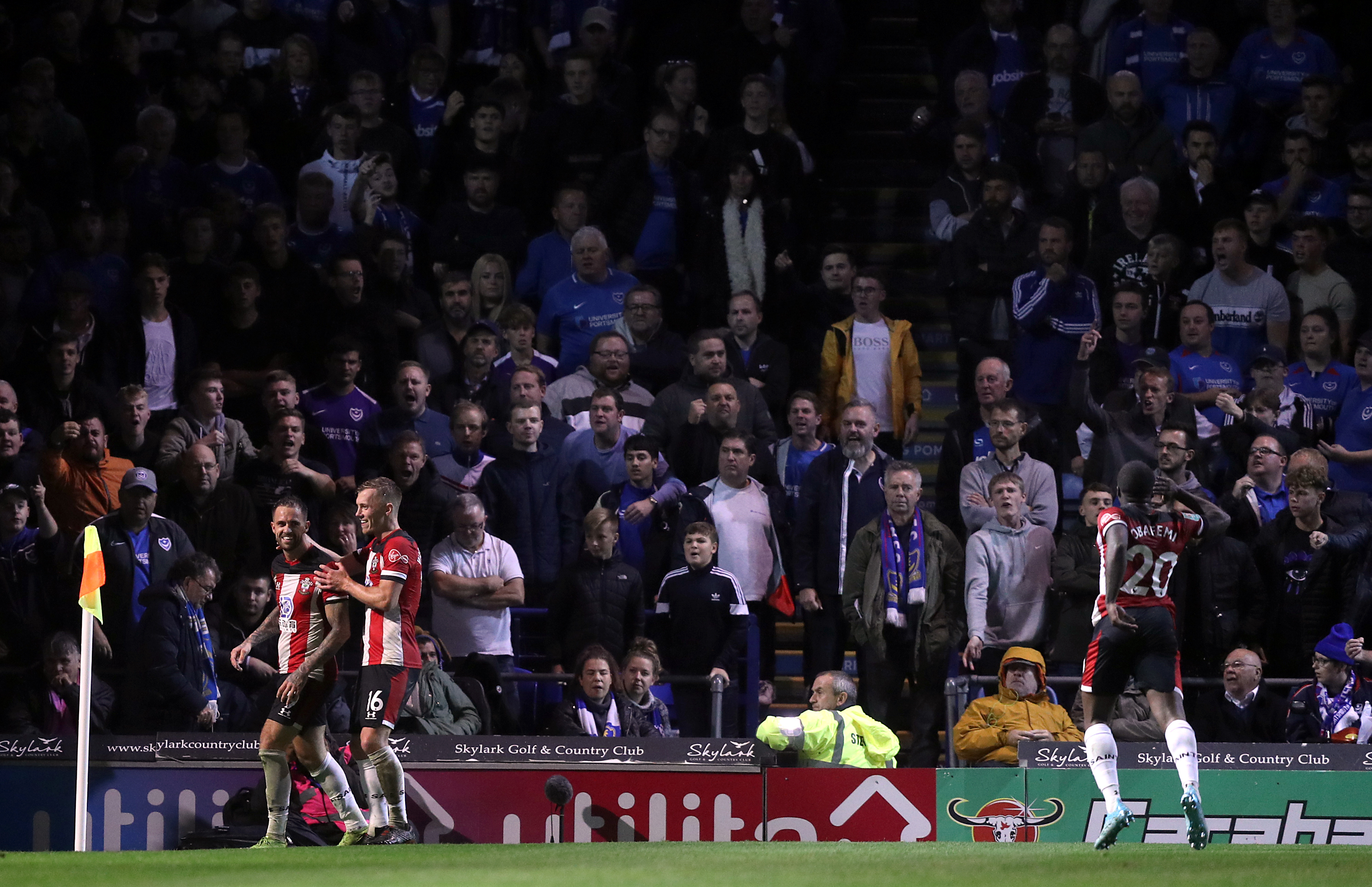 Danny Ings celebrates his second in front of the Portsmouth fans