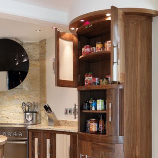 kitchen with larder unit and groceries