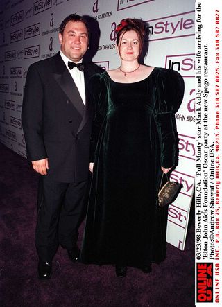 a photo of Mark Addy and his wife Kelly on the red carpet